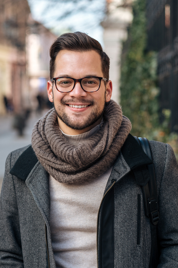Traction-Penis-Enlargement-Treatment A man happily walks on a city street. Get Traction penis enlargement from Vitality Medical in Seattle.