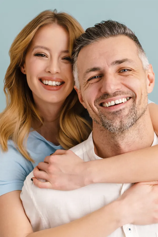 Vitality-Medical-Signature-Anti-Aging-Protocol-Treatment A happy middle-aged couple embrace. Get the Vitality Medical Signature Anti-Aging-Protocol from Vitality Medical in Seattle.