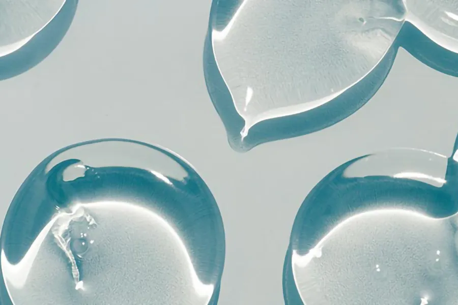 Close-up of clear liquid droplets. Schedule quercetin Anti-Inflammatory Peptide Treatment from Vitality Medical in Seattle.